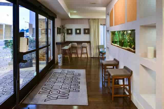 Welcoming Hampton Inn lobby with natural light, ideal for meetings and events.