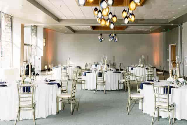 Elegant wedding venue in Norwalk with round tables and navy accents. Perfect for events.