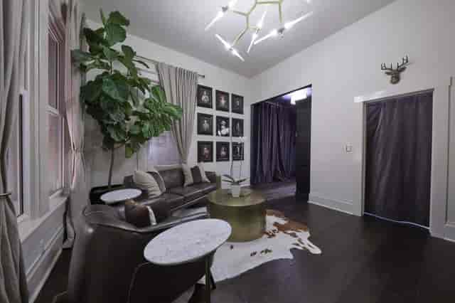 Stylish lounge with plush seating, ideal for creative meetings and small events.