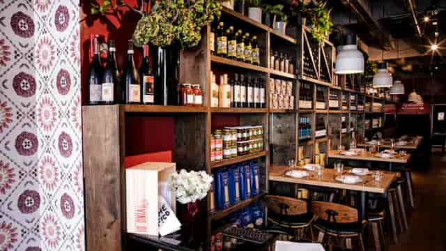 Celentano Room at Che Fico: cozy restaurant interior for intimate gatherings and events.