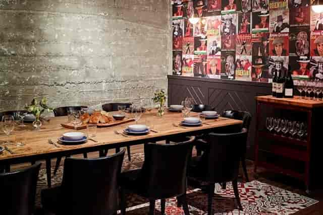 Stylish private dining room at Che Fico, ideal for corporate dinners and events.