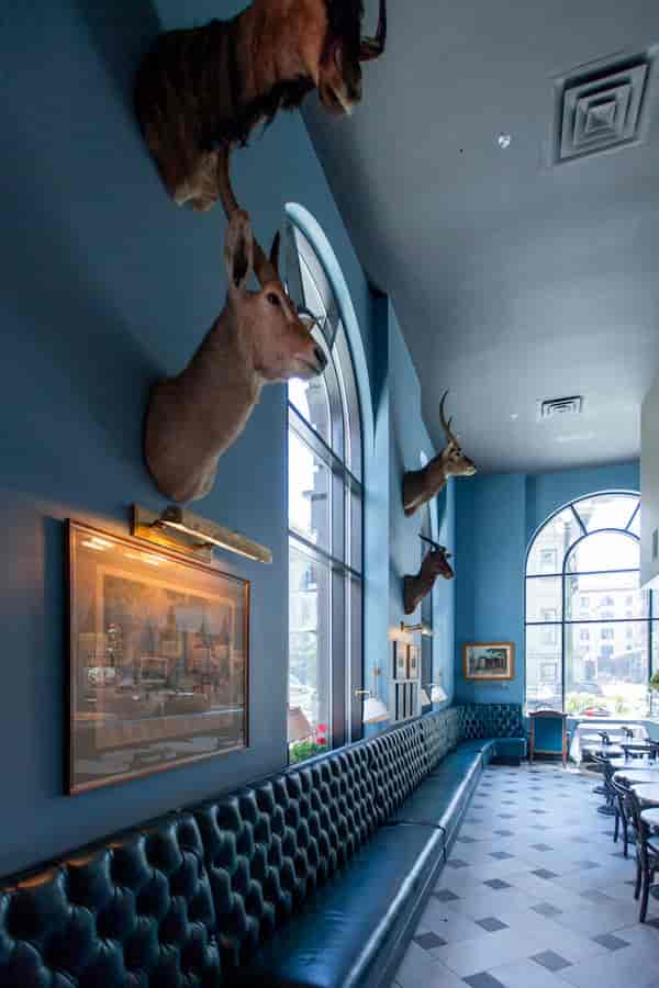 Sophisticated Blue Bar venue with rustic decor, perfect for events and gatherings.