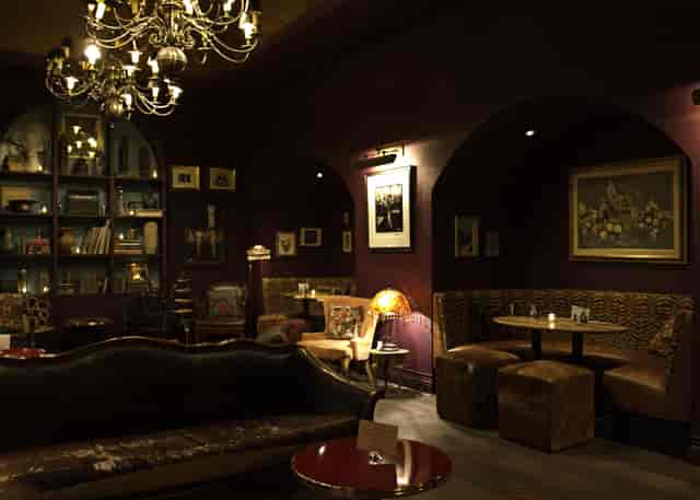 Cozy Speakeasy lounge at The Cavalier, perfect for intimate meetings and networking events.