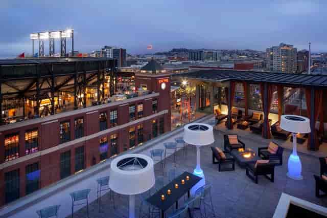Rooftop venue at Hotel VIA with skyline view, ideal for upscale events and cocktail parties.