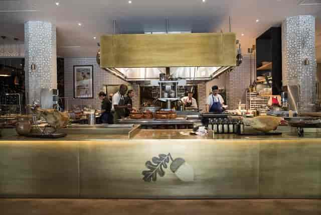 Vibrant open kitchen at Bellota SF, ideal for culinary events and cooking demonstrations.