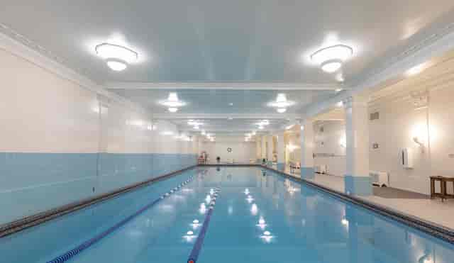 Sleek indoor swimming pool at M Spa, perfect for wellness retreats and events.