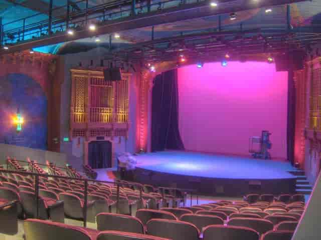 Lounge at Brava Theater Center with vibrant stage, ideal for events and presentations.