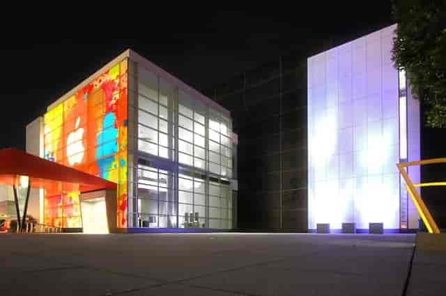Yerba Buena Center at night, featuring vibrant digital displays for events and launches.