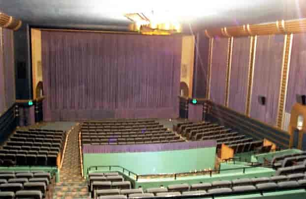 Vintage Presidio Theatre with plush seating, perfect for intimate events and performances.