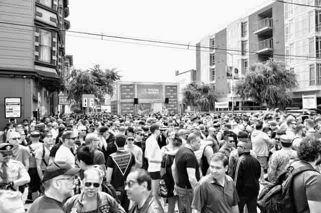 Folsom Street Community Center outdoor event with a bustling crowd and vibrant atmosphere.
