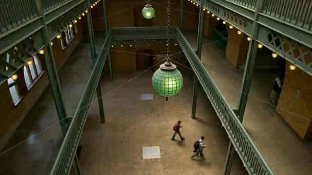 Banatao Room in Berkeley: spacious venue with green pendant lights for events and gatherings.
