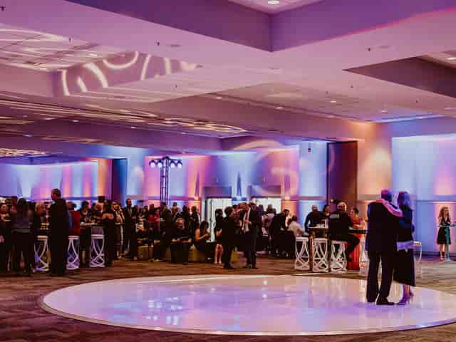 Oyster Point Room, South San Francisco: vibrant event space with elegant lighting, ideal for networking.