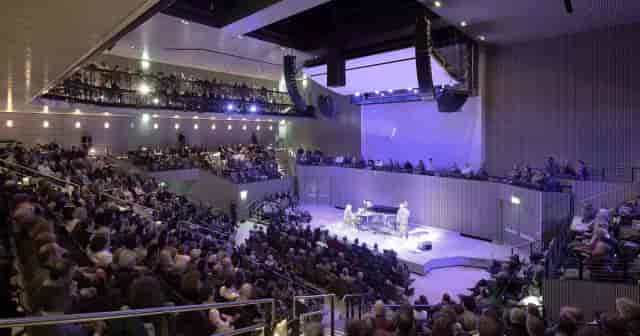 Concert hall with tiered seating, ideal for conferences and performances at 46 Minna.