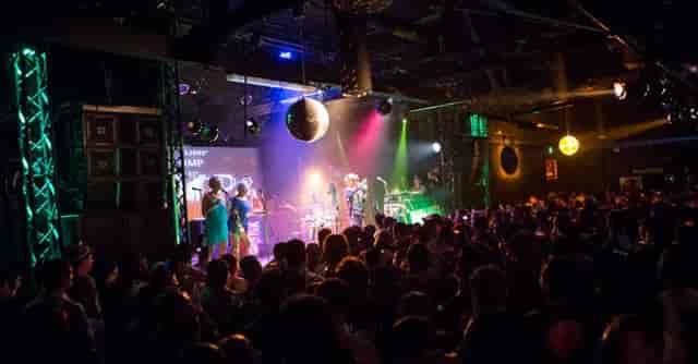 Vibrant live concert at The Echo + Echoplex with dynamic lighting and packed audience.