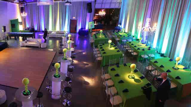 Billiard Room at The Carrus House, elegant event space with vibrant lighting and dance floor.