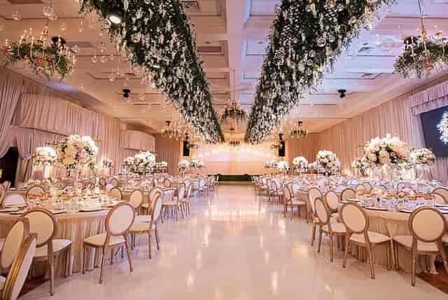 Elegant Angropalace Hall with floral decor, perfect for weddings and banquets.