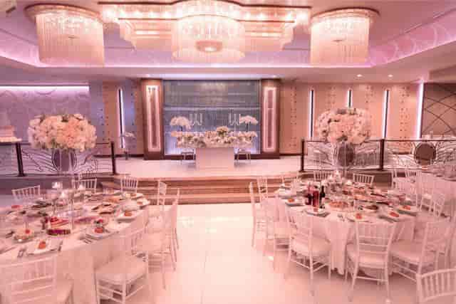 Elegant Arbat Banquet Hall foyer with round tables, perfect for weddings and banquets.
