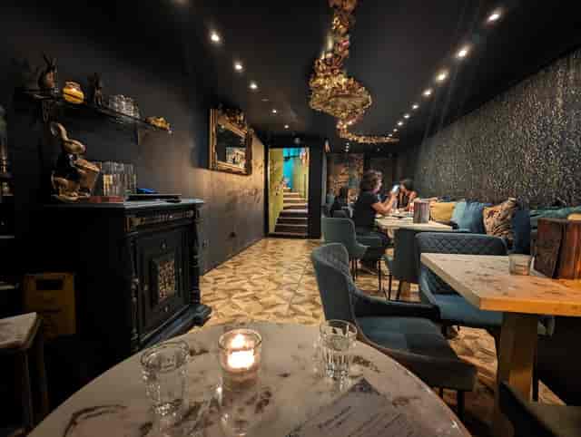 Cozy venue with warm lighting for intimate meetings and networking events.