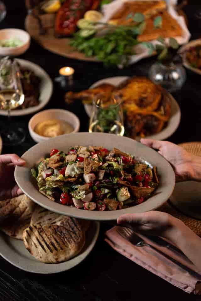 Private dining room at EVE Kensington with vibrant salad for event catering.