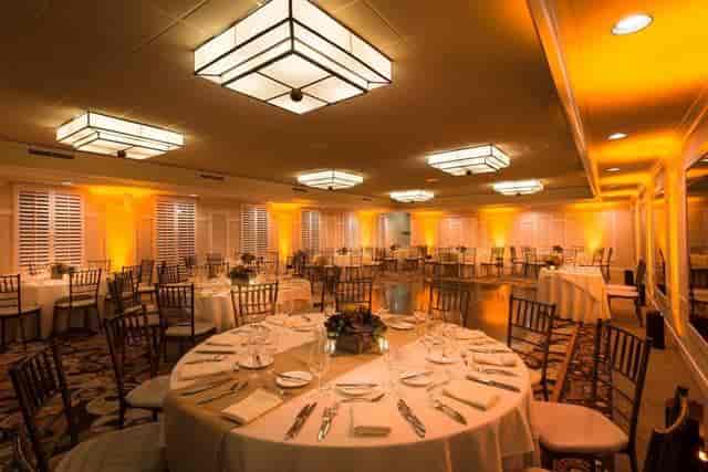 Garland Ballroom event space with elegant tables, ideal for corporate and celebratory gatherings.