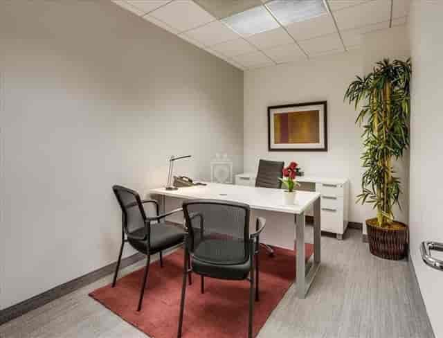 Meeting room in Barrister Suites Burbank, featuring minimalist decor for team meetings.