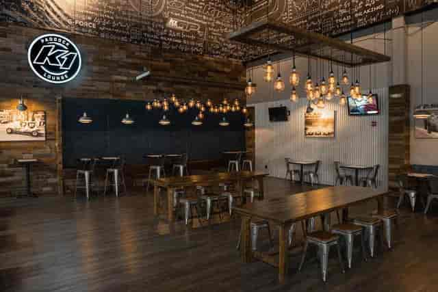 Modern rustic event space at Paddock Lounge, ideal for gatherings and corporate meetings.