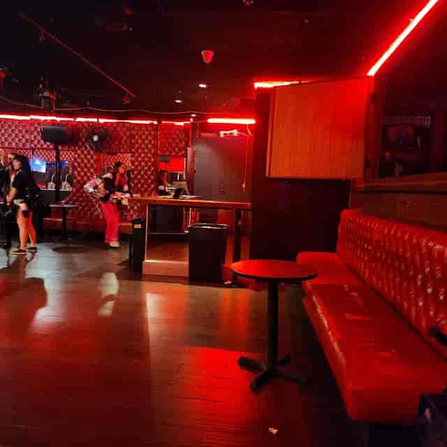 Vibrant Downstairs Stage at LOS GLOBOS, perfect for parties and social gatherings.