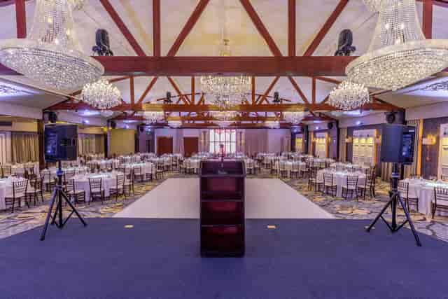 Main Ballroom at The Glen Arden Club, elegant setup for formal events and presentations.