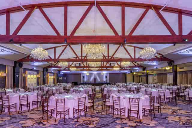 Main Ballroom at The Glen Arden Club, elegant round tables for weddings and banquets.