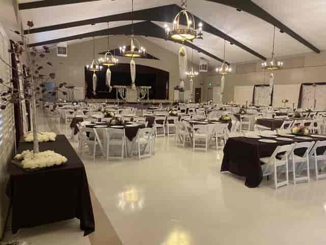 Griffith Park Visitor Center Auditorium with elegant tables, ideal for weddings and corporate events.