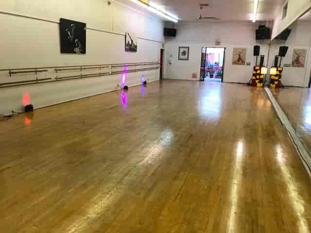 Spacious Hollywood dance studio with polished floor, ideal for events and workshops.