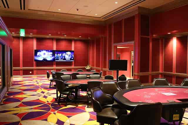 Stylish private meeting room with poker table at Lucky Lady Casino for corporate events.