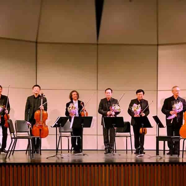 String ensemble at SDSU's Smith Recital Hall, celebrating a live performance finale.