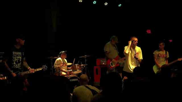 Live band performing at Side Stage, SOMA San Diego - music event atmosphere.
