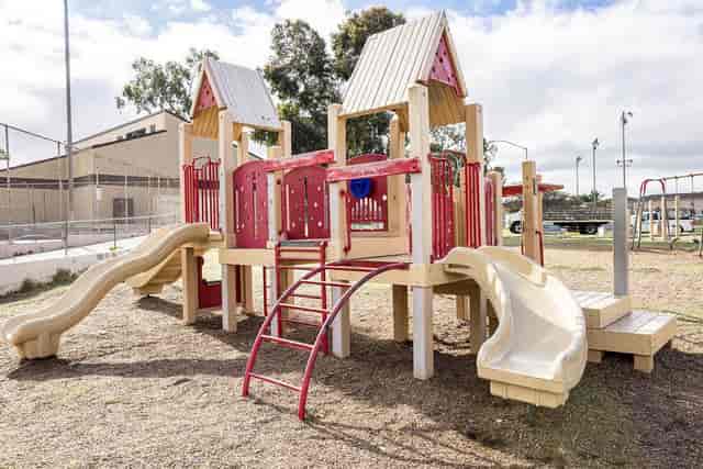 Colorful playground at Linda Vista Recreation Center for family-friendly events.
