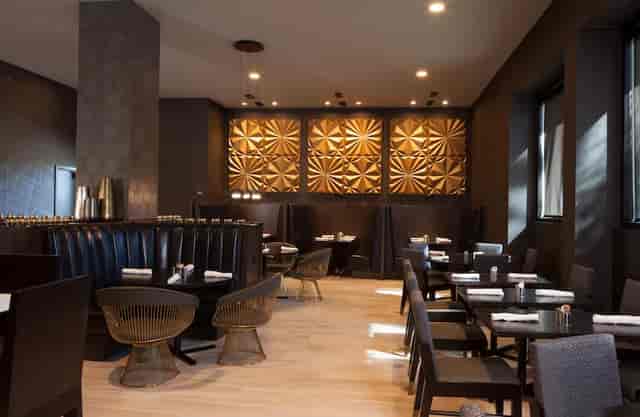 Modern dining space at H Hotel LA, ideal for intimate events and corporate meetings.