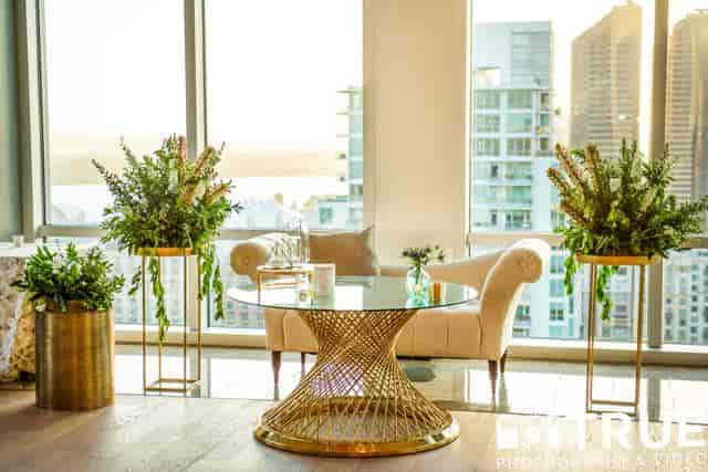 Elegant event space with large windows at The Ultimate Skybox, perfect for upscale gatherings.