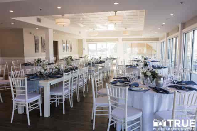 Elegant banquet area with navy blue accents, perfect for weddings and corporate events.
