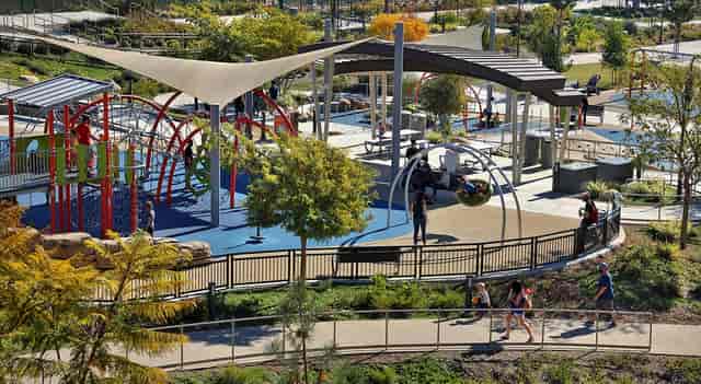 Civita Park Clubroom: vibrant outdoor venue for gatherings and events with play structures.