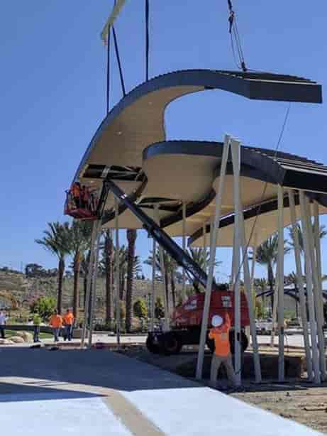 Mining Relic Terrace installation at Civita Park, featuring a lift and palm trees for events.