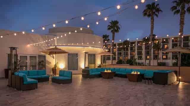 Stylish outdoor event space at Tapestry Collection by Hilton, ideal for receptions and gatherings.