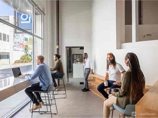 Modern open-concept reception space with natural light for networking events.