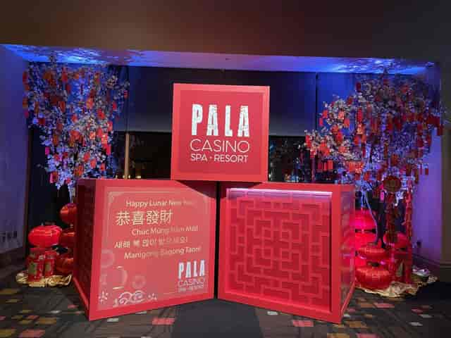 Lunar New Year event setup with red decor and lanterns at Pala Casino Spa Resort.