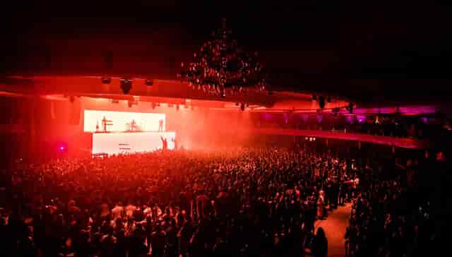 "Hollywood Palladium concert hall with vibrant crowd and dynamic stage lighting"