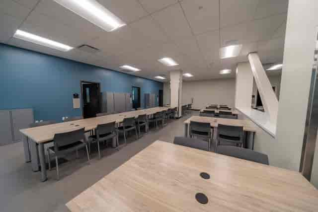 Multi-Purpose Room at Long Beach City College with modular tables for workshops and training.