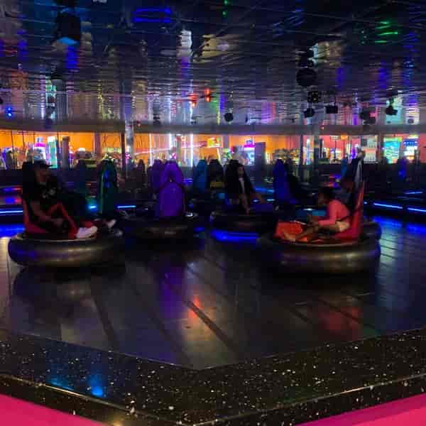 Bumper cars at John's Pizza arcade, perfect for team-building events and social gatherings.