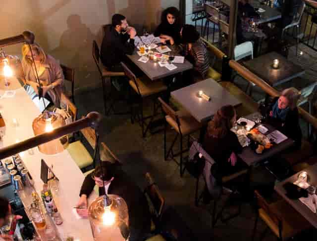Vibrant dining space at The Oak and Vine for networking events and gatherings.