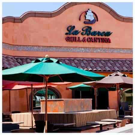 La Barca Grill & Cantina outdoor venue with vibrant umbrellas for casual events.
