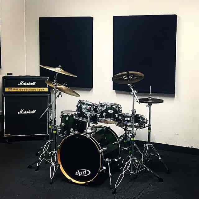 Studio 12 rehearsal space with drum kit, ideal for live music events and band rehearsals.