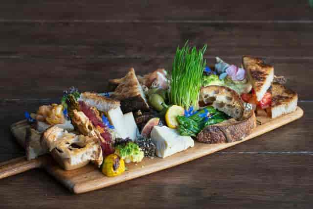 Charcuterie board in The Pearl Hotel meeting space for networking events.